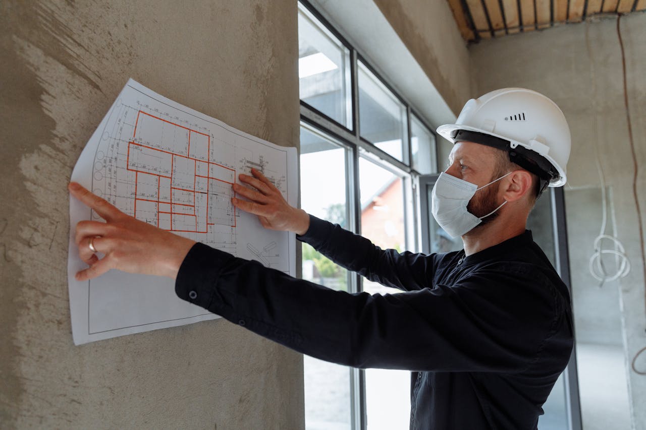 a construction manager reviewing plans