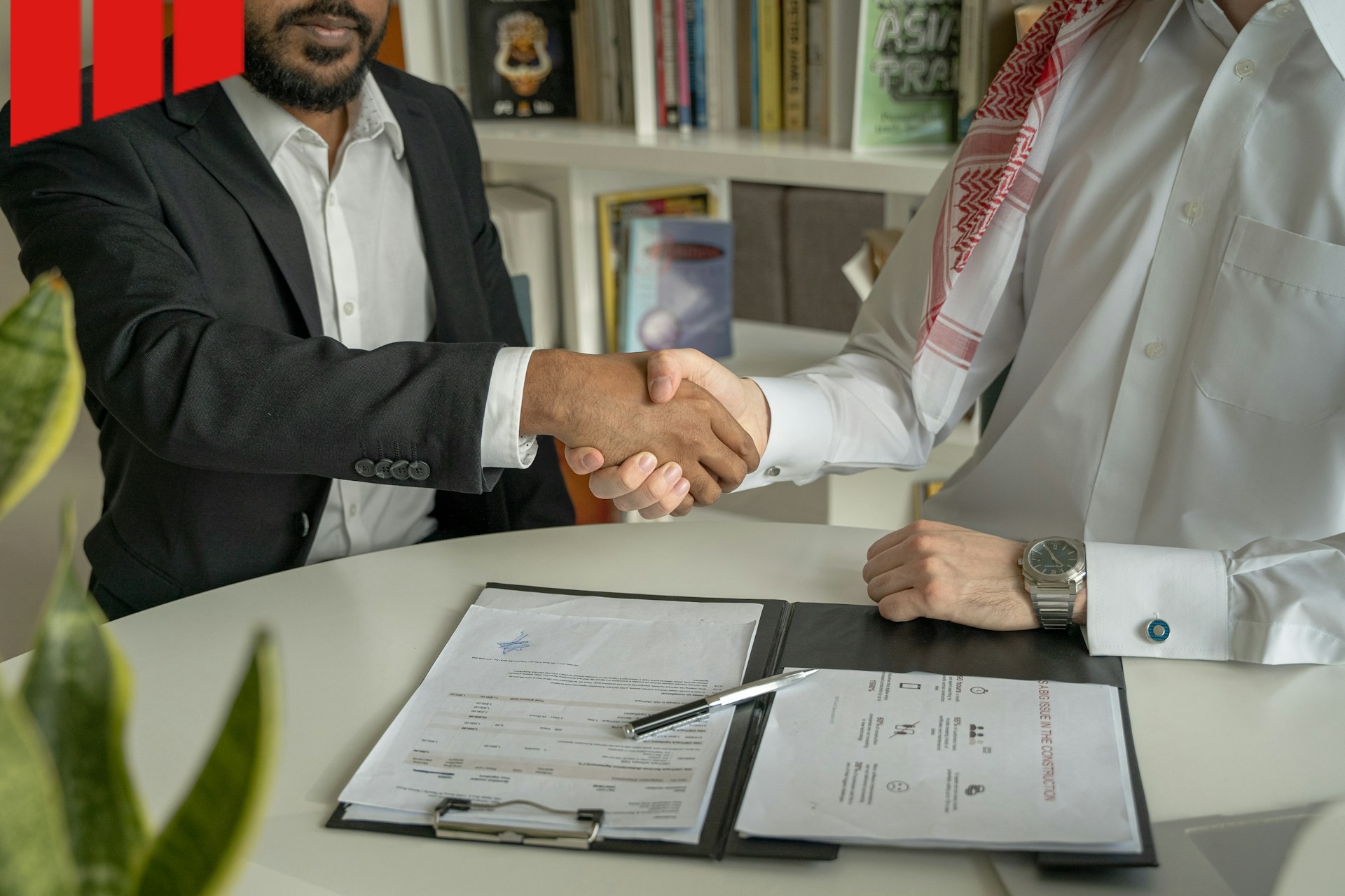 construction claims management meeting handshake 