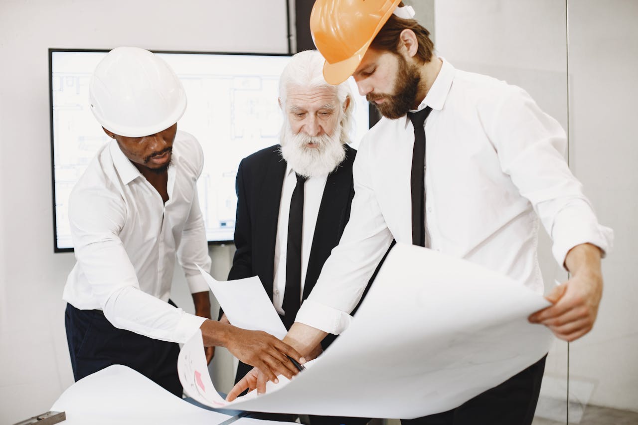 construction managers reviewing documents